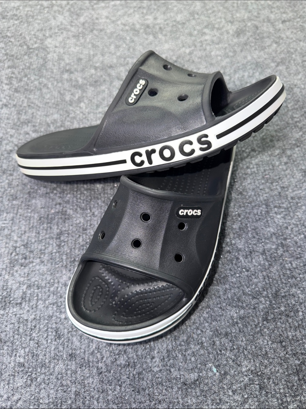 CROCS Black Slide Sandals with White Trim